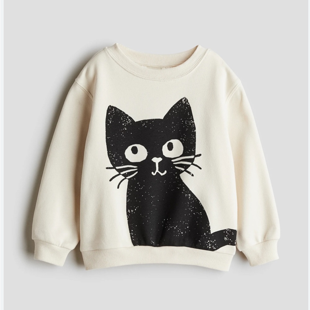 H&M Cream Sweatshirt with Black Cat Design
